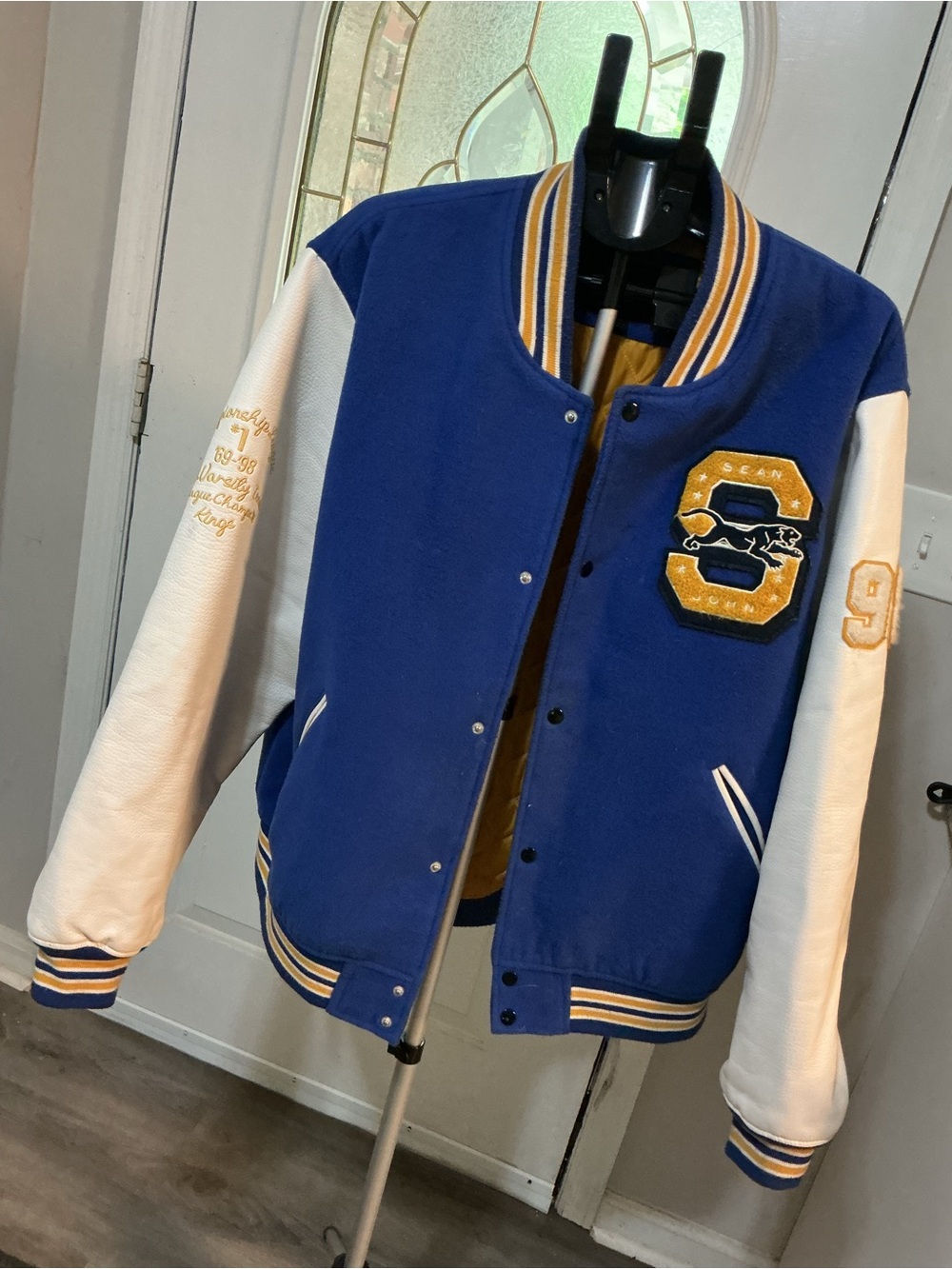 Blue & White Letterman Jacket with Gold Patch